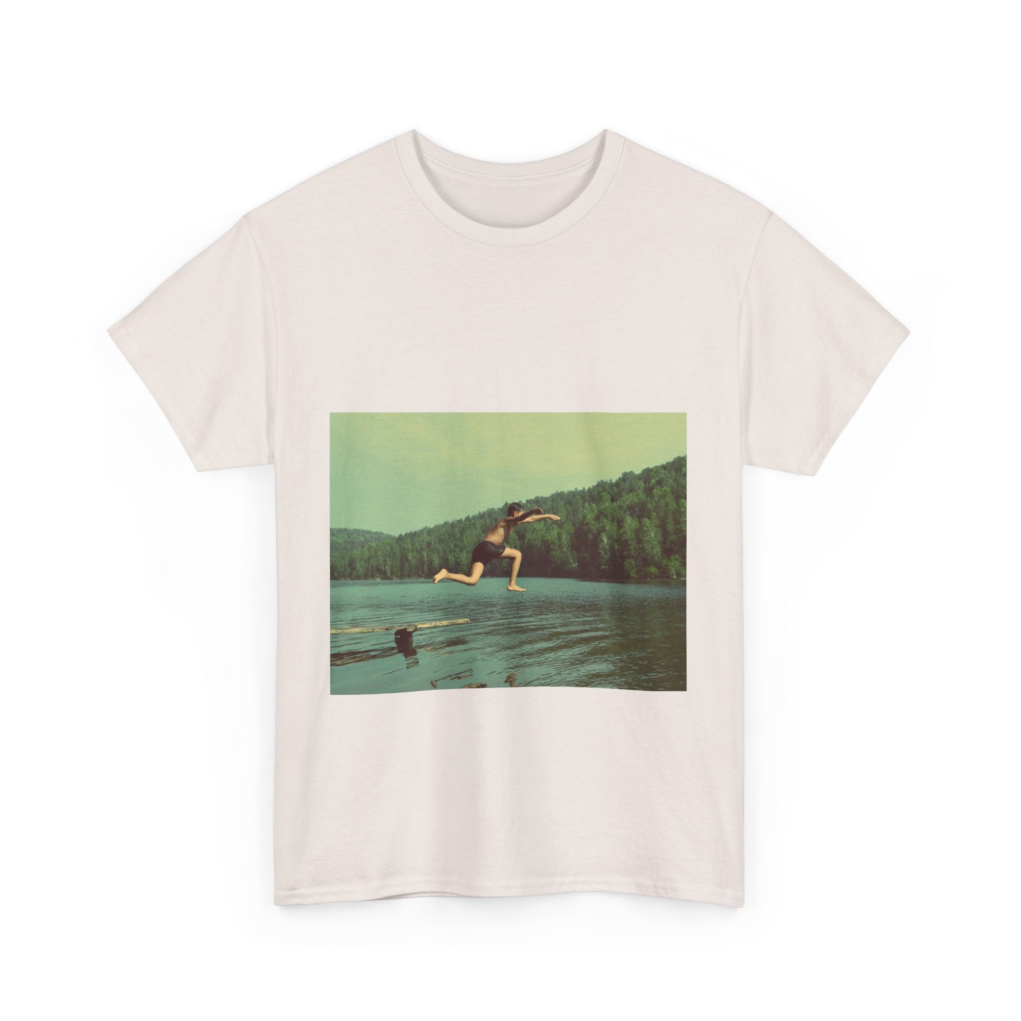 Beige t-shirt with a graphic of a person jumping into a lake on a white background