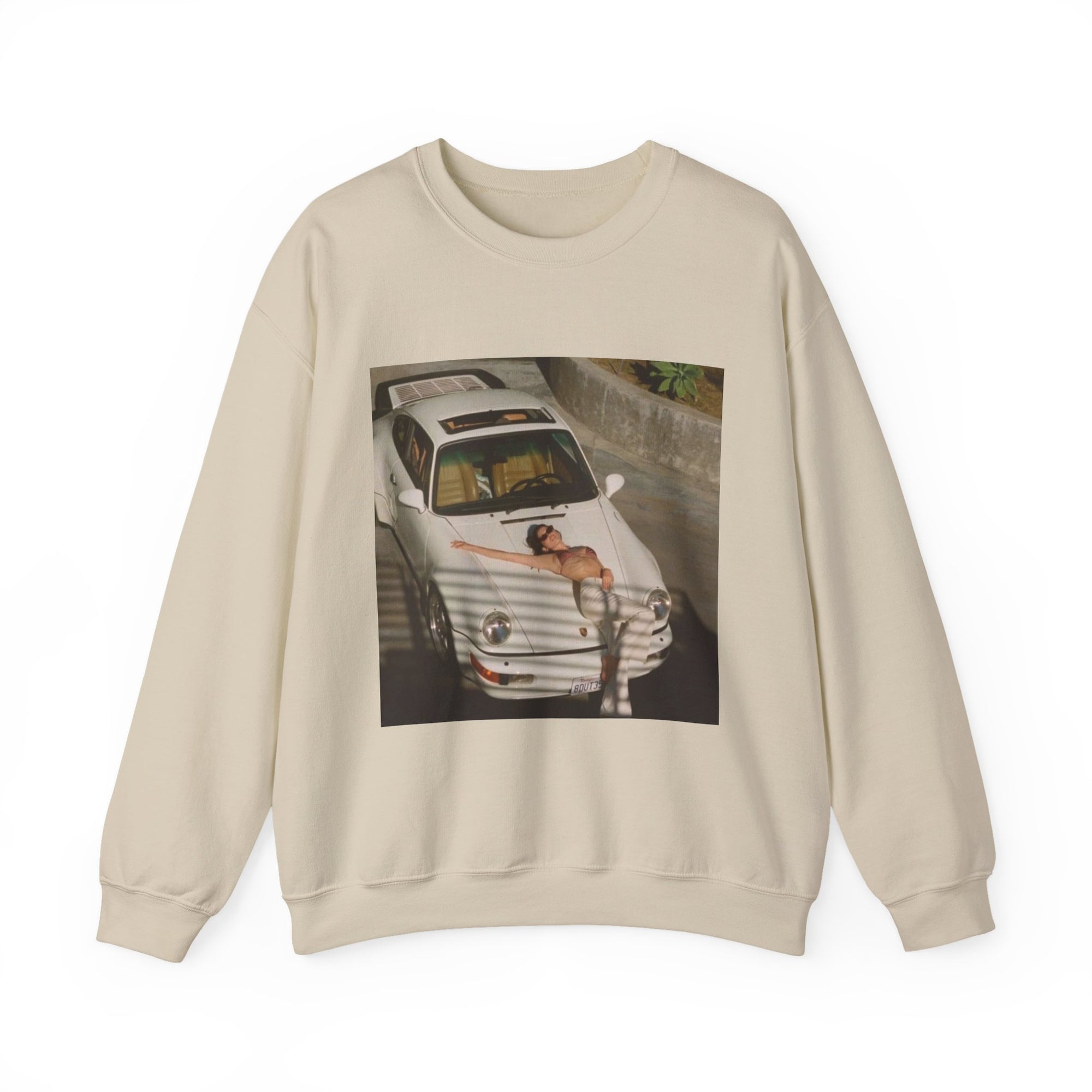 sweatshirt with a graphic of a white porsche car and sexy woman on the hood 