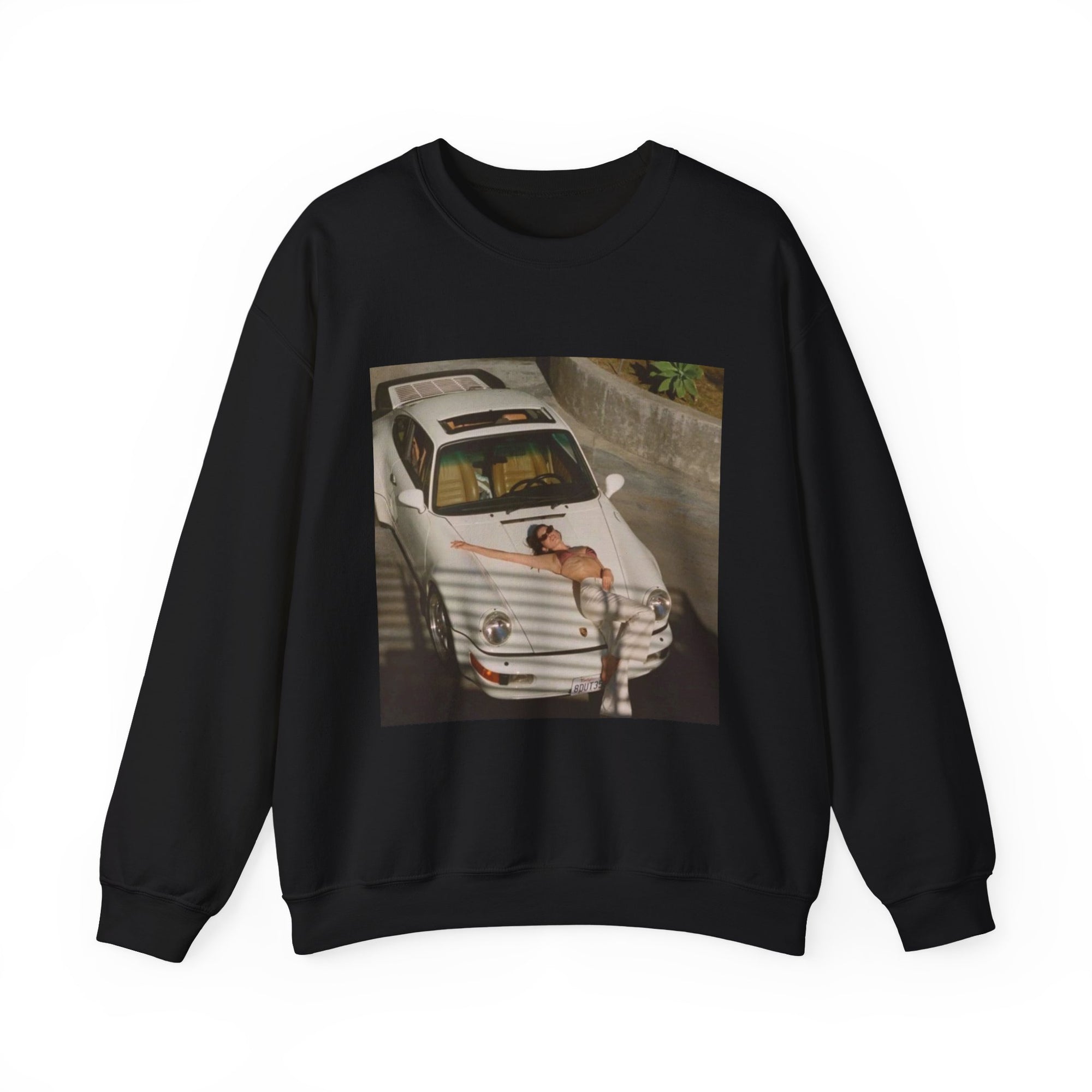 sweatshirt with a graphic of a white porsche car and sexy woman on the hood 