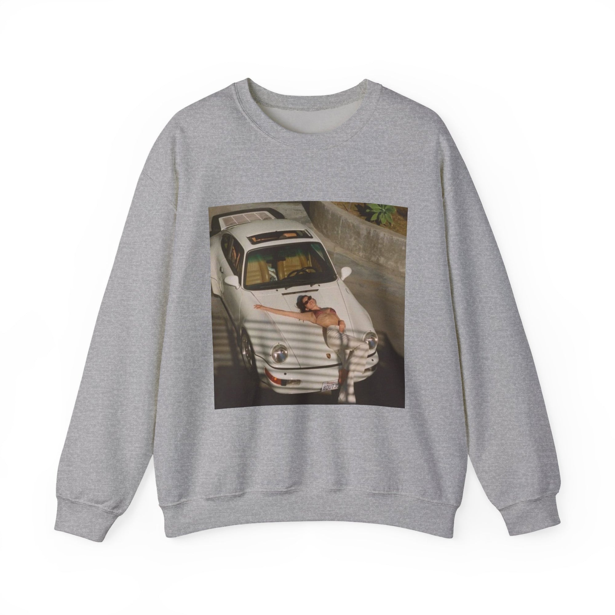 sweatshirt with a graphic of a white porsche car and sexy woman on the hood 