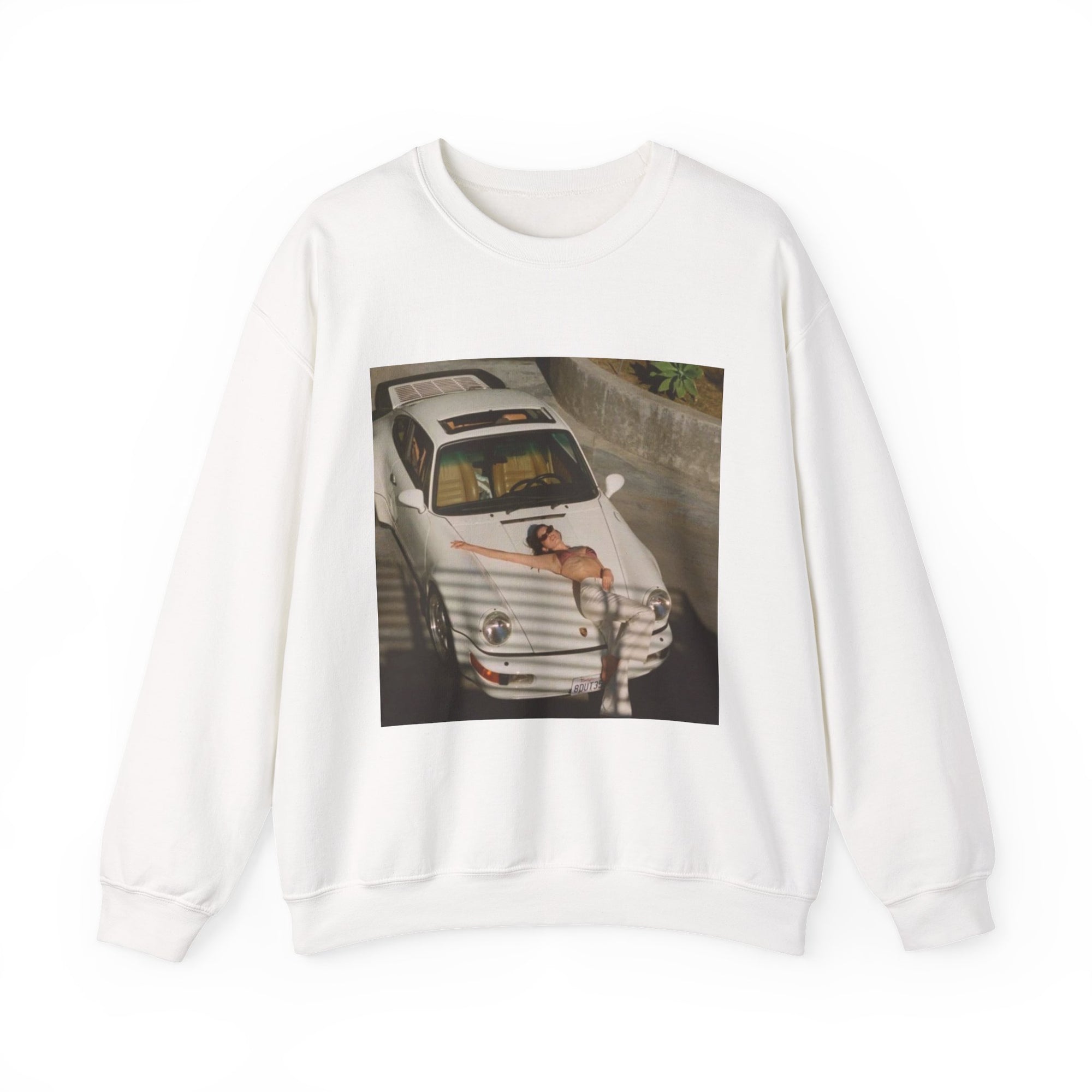 sweatshirt with a graphic of a white porsche car and sexy woman on the hood 
